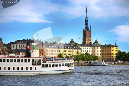 Image of STOCKHOLM, SWEDEN - AUGUST 20, 2016: Tourists boat and View of G