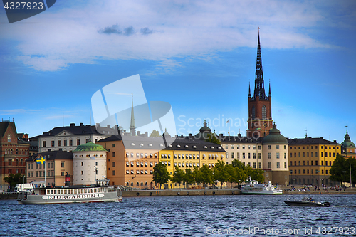 Image of STOCKHOLM, SWEDEN - AUGUST 20, 2016: Tourists boat and View of G