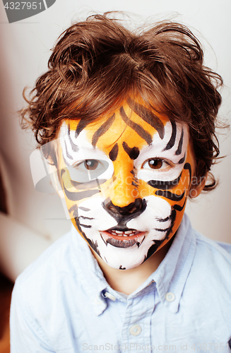 Image of little cute boy with faceart on birthday party close up, little 