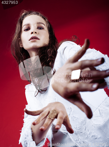 Image of young pretty emitonal posing sexy girl on bright red background, happy smiling lifestyle people concept