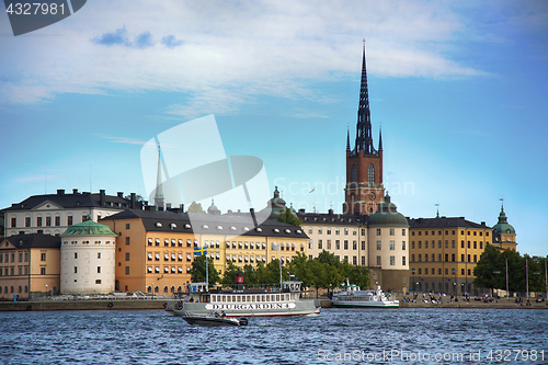 Image of STOCKHOLM, SWEDEN - AUGUST 20, 2016: Tourists boat and View of G