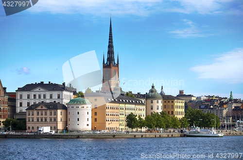 Image of STOCKHOLM, SWEDEN - AUGUST 20, 2016: Tourists boat and View of G