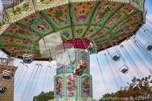 Image of VIENNA, AUSTRIA - AUGUST  17, 2012: View of Merry-go-round spinn