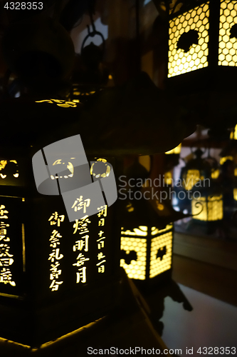 Image of Lanterns lighting in the dark, Kasuga-Taisha Shrine, Nara, Japan