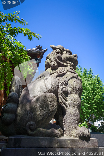 Image of Lion statue in Ushijima Shrine temple, Tokyo, Japan