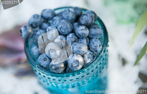 Image of Useful blueberry berry in a vintage cup