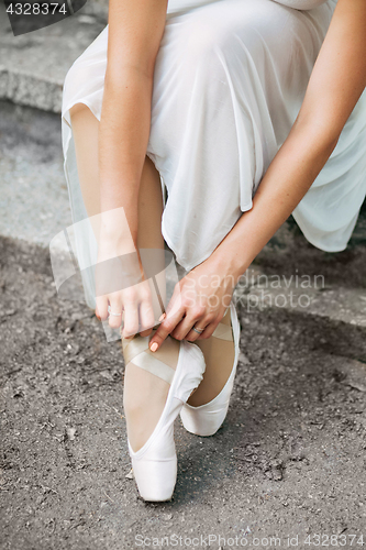 Image of Legs of a beautiful ballerina close-up.