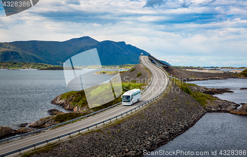 Image of Tourist bus traveling on the road in Norway