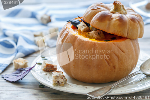 Image of Pumpkin soup with croutons.