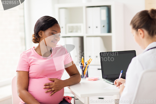 Image of gynecologist doctor and pregnant woman at hospital