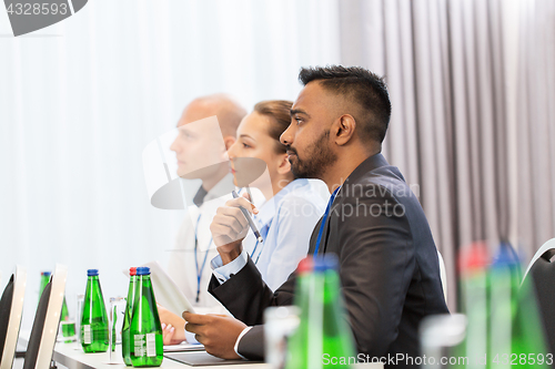 Image of business team at international conference