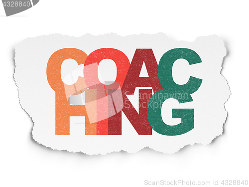 Image of Learning concept: Coaching on Torn Paper background
