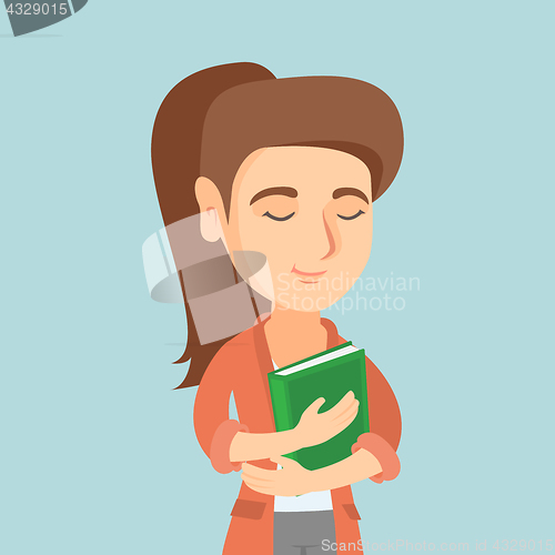 Image of Young caucasian student hugging a book.