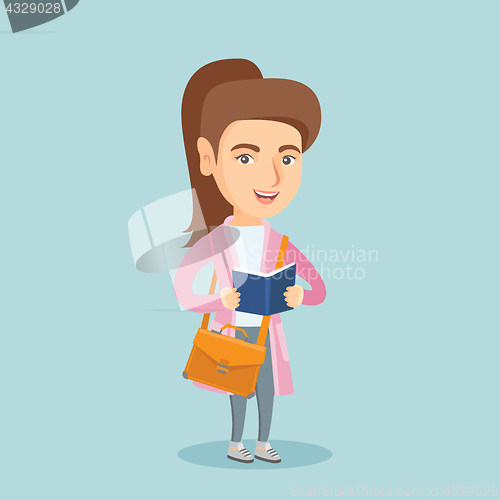 Image of Young caucasian student reading a book.