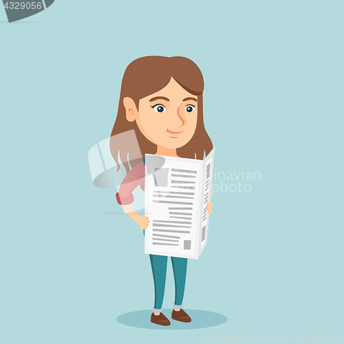 Image of Young caucasian woman reading a newspaper.