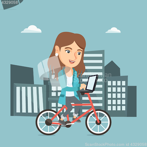Image of Business woman riding a bicycle with a laptop.