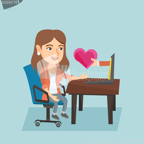 Image of Woman looking for online date on the internet.