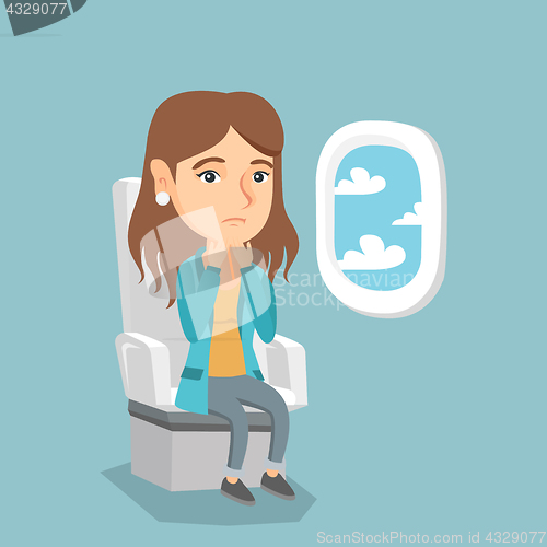 Image of Young caucasian woman suffering from aerophobia.