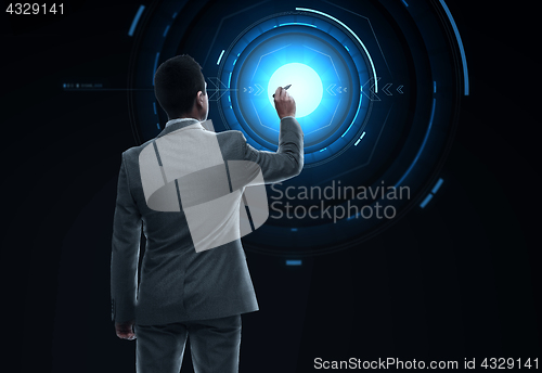 Image of businessman working with virtual reality screen