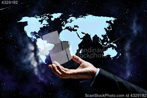 Image of close up of businessman hand with world map