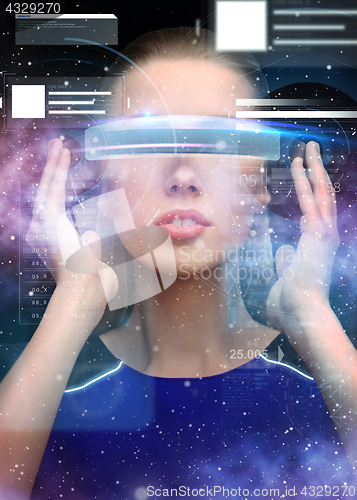 Image of woman in virtual reality 3d glasses with charts