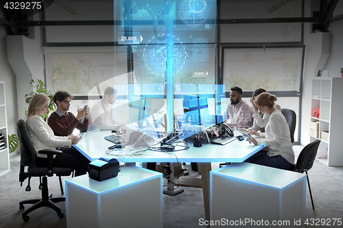 Image of business team with computers working at office