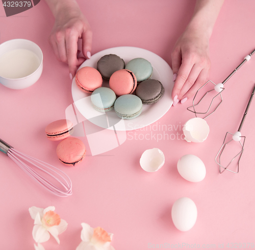 Image of cookies cream on pink background