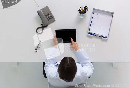 Image of doctor with tablet pc at clinic