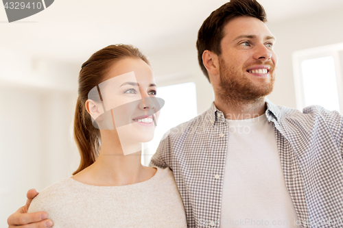 Image of happy couple at new home