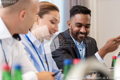 Image of happy business team at international conference