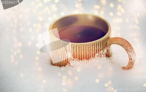 Image of tea or coffee mug in snow