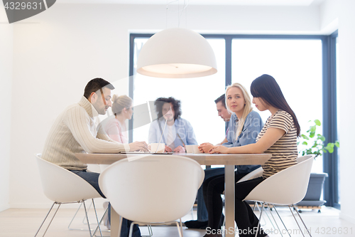 Image of Startup Business Team At A Meeting at modern office building