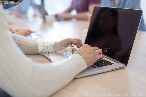 Image of Startup Business Team At A Meeting at modern office building