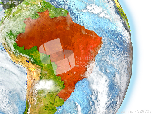 Image of Brazil in red on Earth