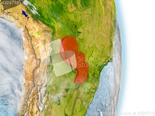 Image of Paraguay in red on Earth