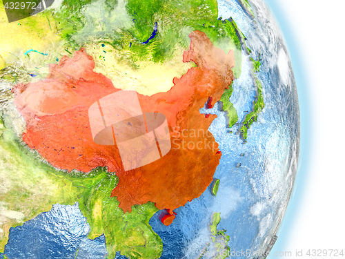 Image of China in red on Earth