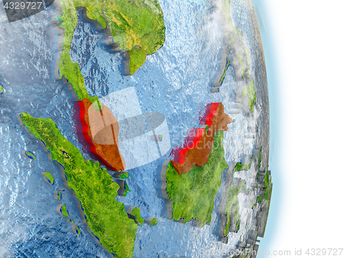 Image of Malaysia in red on Earth