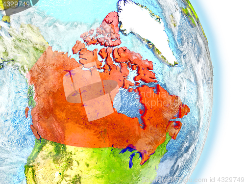 Image of Canada in red on Earth