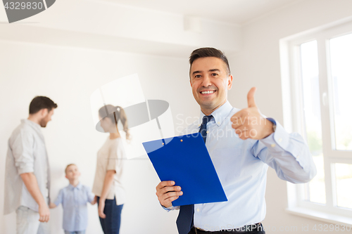 Image of realtor with clipboard showing thumbs up