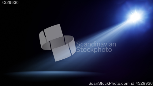 Image of blue stage light beam background