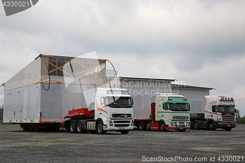 Image of Three Oversize Load Transport Trucks