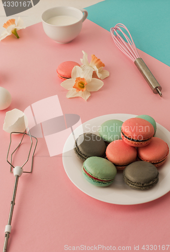 Image of cookies cream on pink background