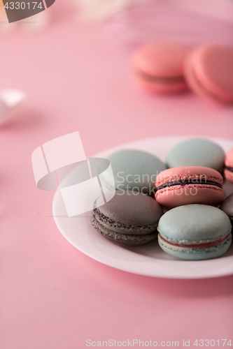 Image of cookies cream on pink background