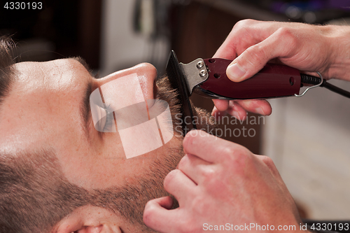 Image of Hipster client visiting barber shop