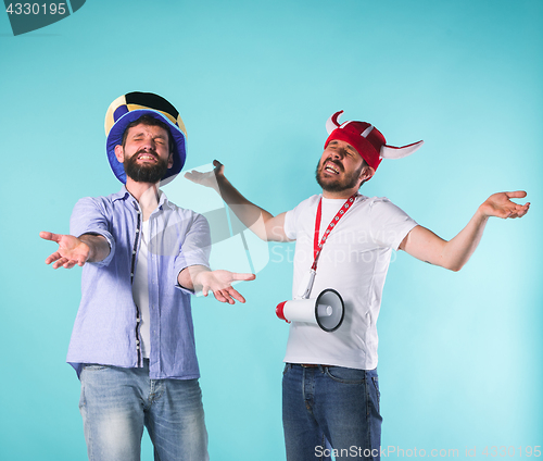 Image of Two Excited Male Friends Celebrate Watching Sports