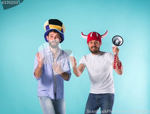 Image of Two Excited Male Friends Celebrate Watching Sports