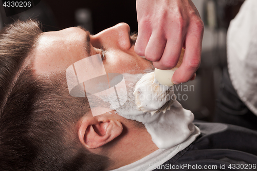 Image of Hipster client visiting barber shop