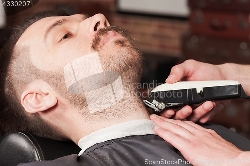 Image of Hipster client visiting barber shop