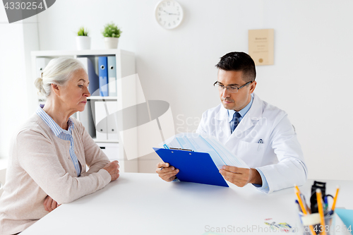 Image of senior woman and doctor meeting at hospital