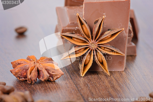 Image of Anise, milk chocolate and coffee beans